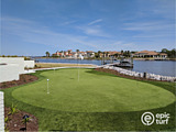 golf green practice by the water - residential